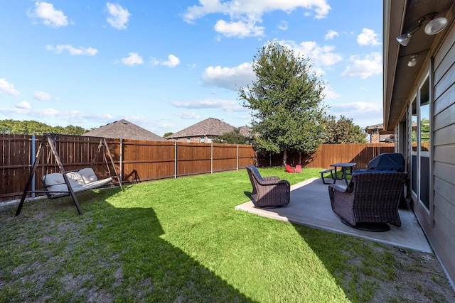 view of yard with a fenced backyard and a patio area