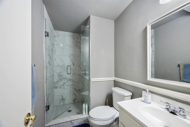 1112 Berkley Ave, Dallas, TX 75224 - full bathroom with a marble finish shower, toilet, vanity, and a textured ceiling