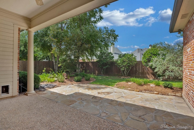 view of patio with a fenced backyard