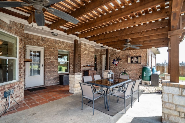 view of patio featuring a grill, a pergola, ceiling fan, and outdoor dining space
