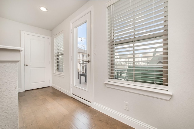 1117 Tea Olive Ln, Dallas, TX 75212 - entryway featuring wood finished floors, baseboards, and recessed lighting