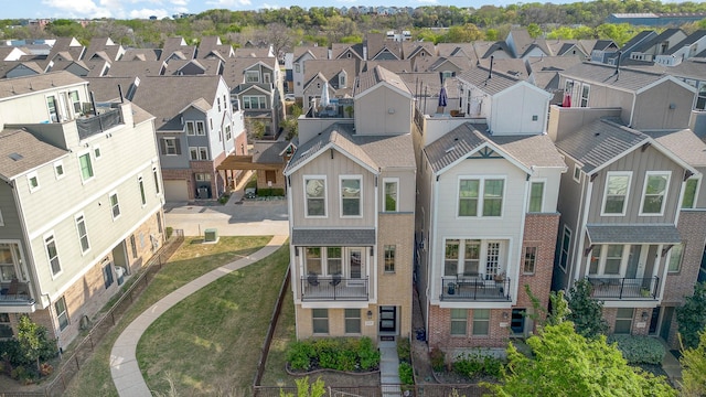 1117 Tea Olive Ln, Dallas, TX 75212 - view of front facade with a residential view, board and batten siding, brick siding, and fence
