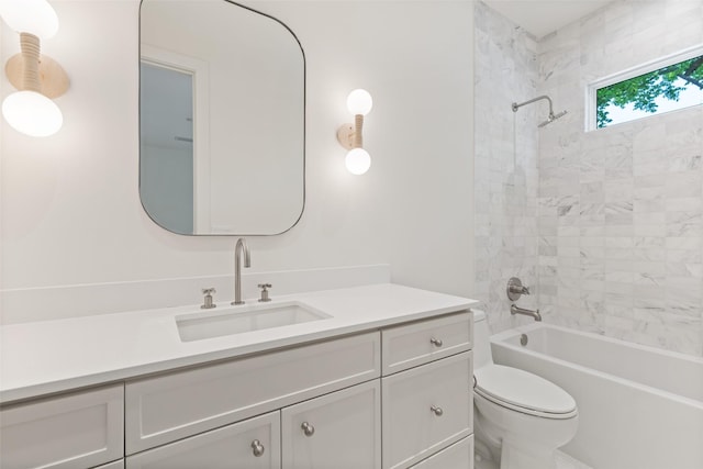 bathroom featuring shower / bath combination, vanity, and toilet