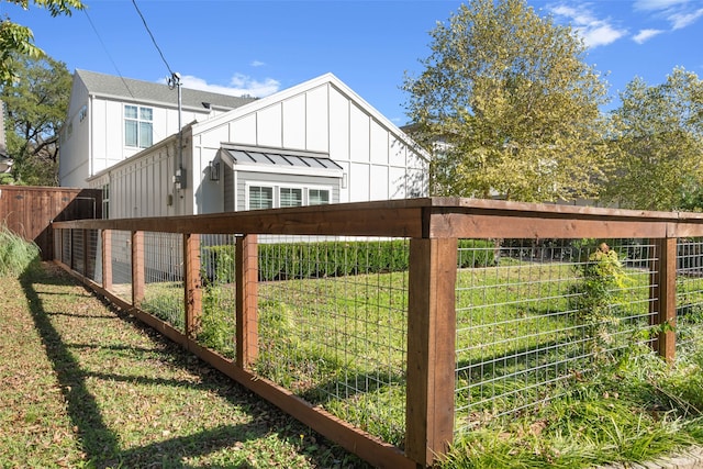 view of gate featuring fence