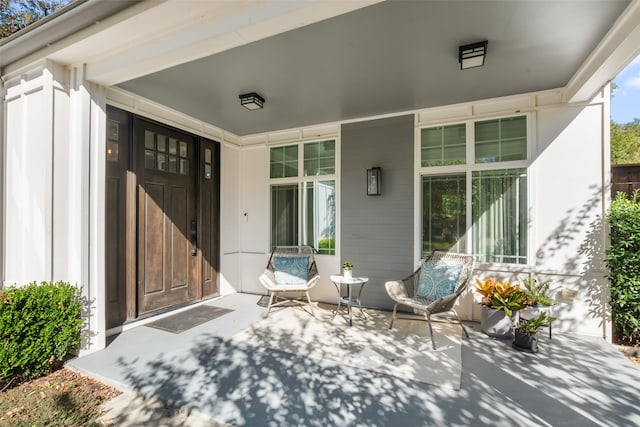 view of patio featuring a porch