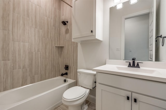 full bathroom featuring toilet, vanity, and bathing tub / shower combination