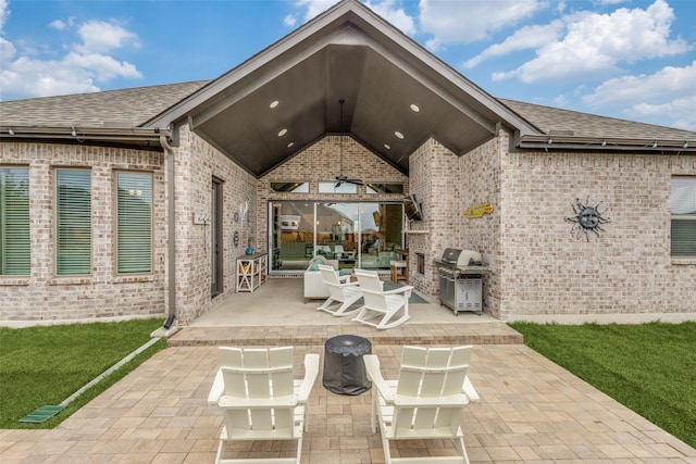 view of patio featuring area for grilling and exterior kitchen