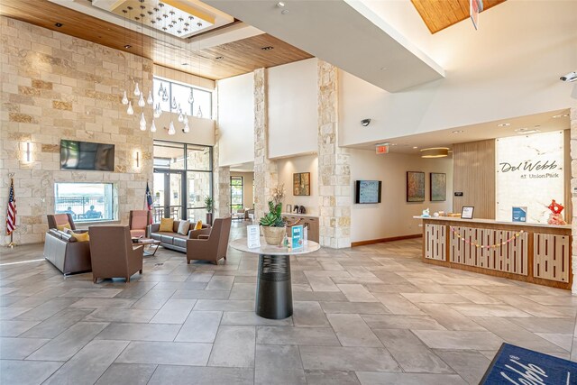 1256 Bright Stars Dr, Little Elm, TX 76227 - building lobby with a high ceiling and wooden ceiling