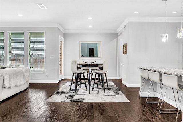 3627 Harvest Ln, Frisco, TX 75034 - dining area with crown molding, baseboards, dark wood finished floors, and recessed lighting