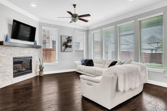 3627 Harvest Ln, Frisco, TX 75034 - living room featuring baseboards, healthy amount of natural light, a ceiling fan, wood finished floors, and crown molding
