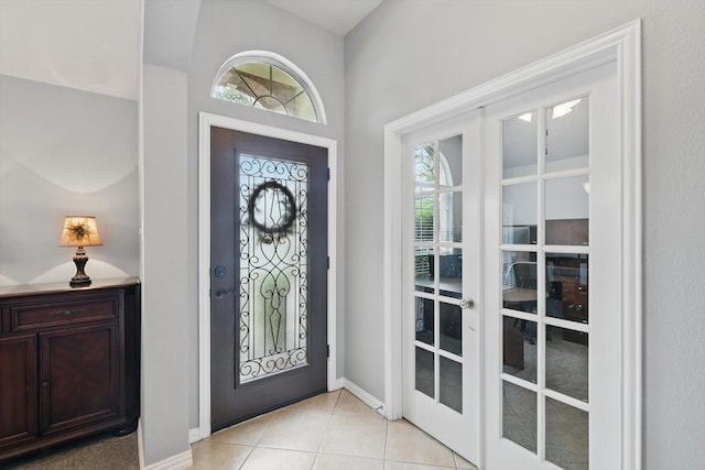 1443 Sleepy Hollow Dr, Allen, TX 75002 - foyer featuring french doors, baseboards, and light tile patterned floors