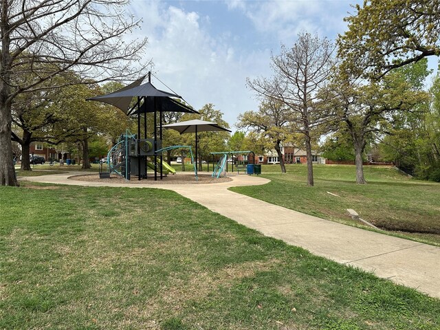 7113 Raintree Way, Denton, TX 76210 - view of property's community with a yard and playground community