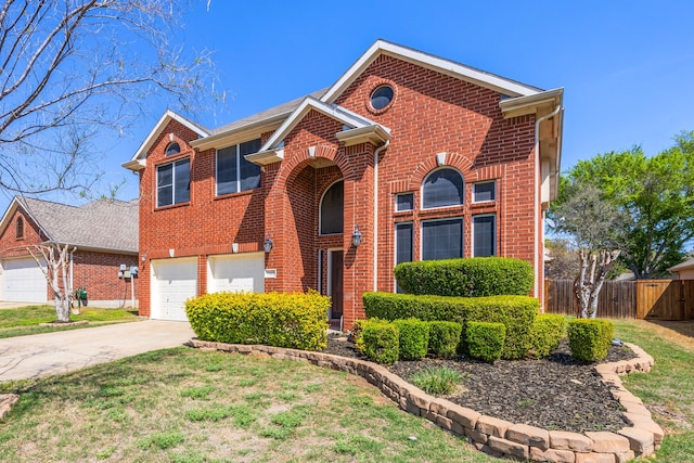 7113 Raintree Way, Denton, TX 76210 - traditional-style house featuring fence, a front yard, brick siding, concrete driveway, and an attached garage