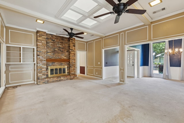 unfurnished living room with a decorative wall, crown molding, a ceiling fan, a brick fireplace, and carpet floors