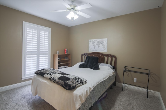 bedroom with baseboards, ceiling fan, and carpet