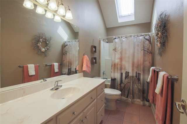 full bathroom featuring tile patterned flooring, vanity, toilet, a skylight, and shower / bath combination with curtain