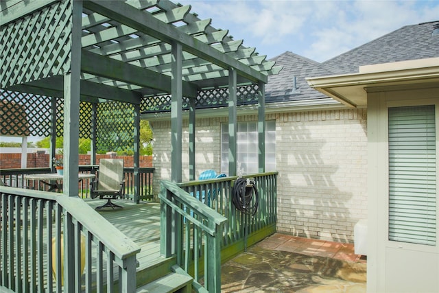 wooden deck with a pergola