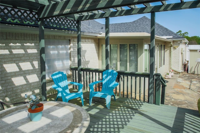 wooden terrace with a pergola