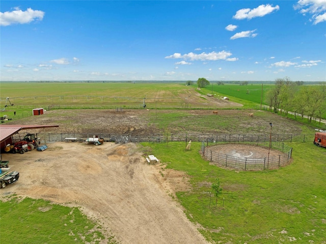 birds eye view of property with a rural view