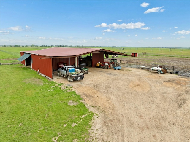 exterior space with a rural view
