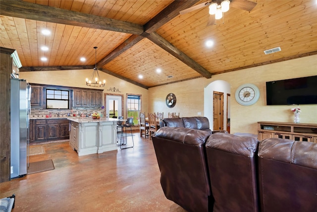 living room with finished concrete flooring, wood ceiling, arched walkways, beamed ceiling, and a ceiling fan