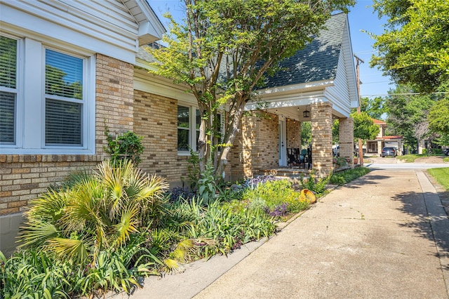 1936 Forest Park Blvd, Fort Worth, TX 76110 - view of home's exterior with brick siding, roof with shingles, and covered porch