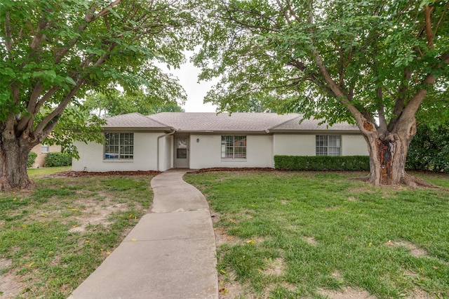 3100 E Park Blvd, Plano, TX 75074 - ranch-style home with stucco siding and a front lawn