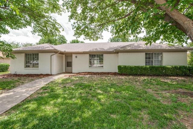 3100 E Park Blvd, Plano, TX 75074 - ranch-style home featuring brick siding, a front yard, and roof with shingles