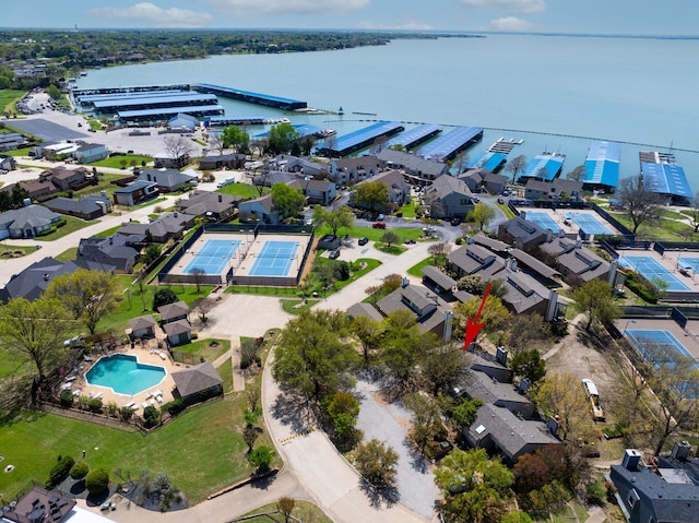 birds eye view of property featuring a water view