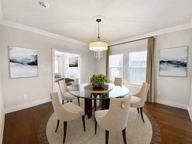 1217 Kings Hwy, Dallas, TX 75208 - dining area with baseboards, dark wood-style floors, and ornamental molding