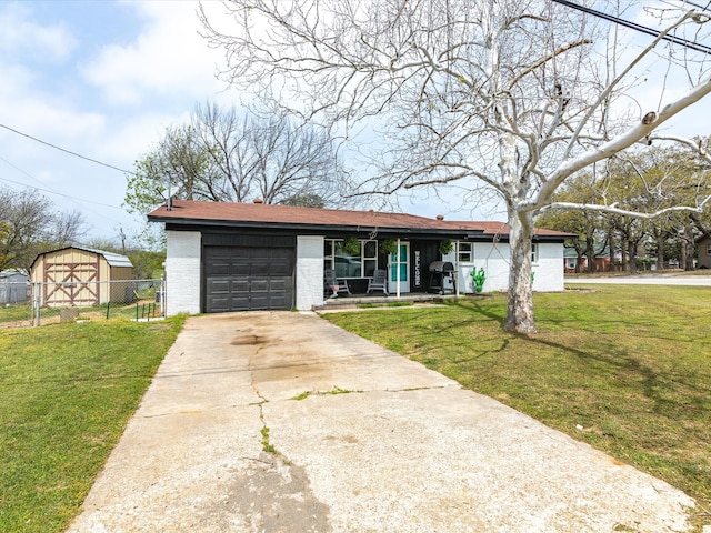 1306 Hulme St, Bowie, TX 76230 - view of front of home with driveway, a garage, fence, and a front yard