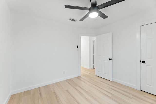 9056 Berkshire Dr, Frisco, TX 75033 - unfurnished bedroom with light wood finished floors, baseboards, and a ceiling fan