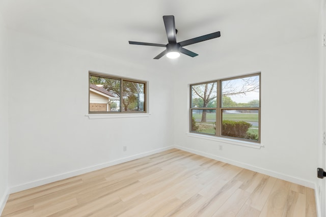9056 Berkshire Dr, Frisco, TX 75033 - spare room with wood finished floors, baseboards, and a ceiling fan