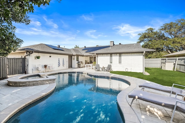 view of pool featuring a fenced backyard, an in ground hot tub, a patio area, and a fenced in pool