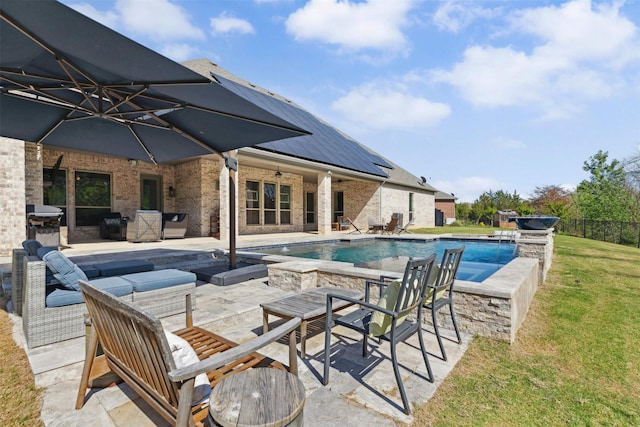 2602 Cypress Dr, Rockwall, TX 75087 - view of swimming pool featuring a fenced in pool, ceiling fan, a patio area, and a lawn