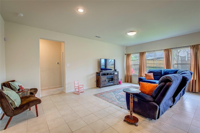 914 Edgar St, Greenville, TX 75401 - living room with recessed lighting, light tile patterned flooring, baseboards, and visible vents