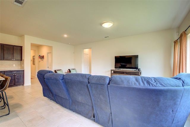 914 Edgar St, Greenville, TX 75401 - living room featuring light tile patterned floors and visible vents