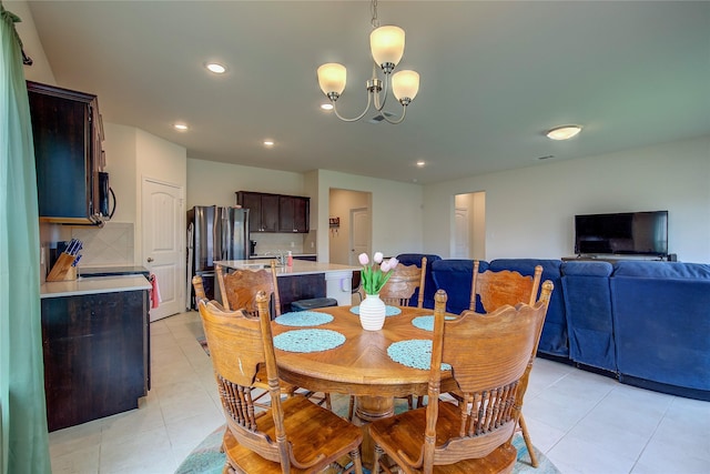 914 Edgar St, Greenville, TX 75401 - dining area with light tile patterned floors, a chandelier, and recessed lighting
