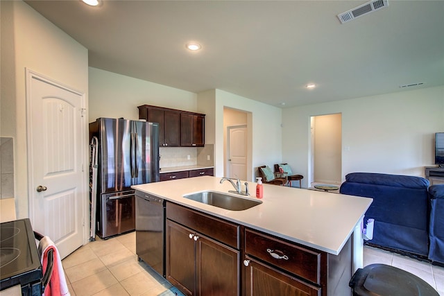 914 Edgar St, Greenville, TX 75401 - kitchen featuring visible vents, dishwasher, a sink, electric range, and freestanding refrigerator