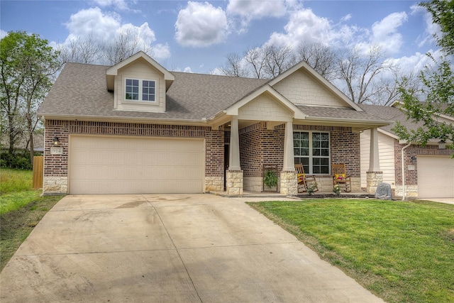 914 Edgar St, Greenville, TX 75401 - craftsman house with a front yard, concrete driveway, roof with shingles, and an attached garage