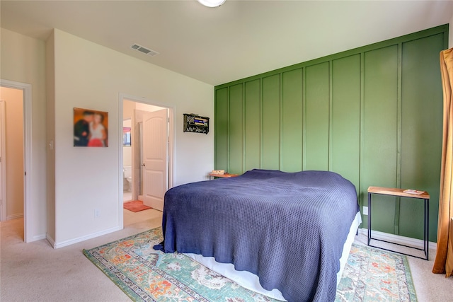 914 Edgar St, Greenville, TX 75401 - bedroom with light colored carpet, visible vents, and baseboards