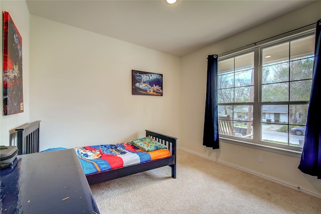 914 Edgar St, Greenville, TX 75401 - bedroom featuring baseboards, carpet floors, and radiator