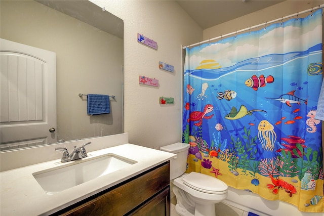 914 Edgar St, Greenville, TX 75401 - full bath featuring toilet, shower / bath combo with shower curtain, and vanity