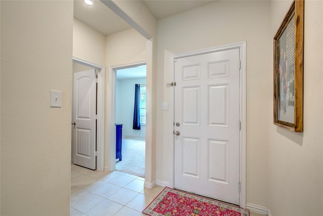 914 Edgar St, Greenville, TX 75401 - foyer entrance with baseboards and light tile patterned floors