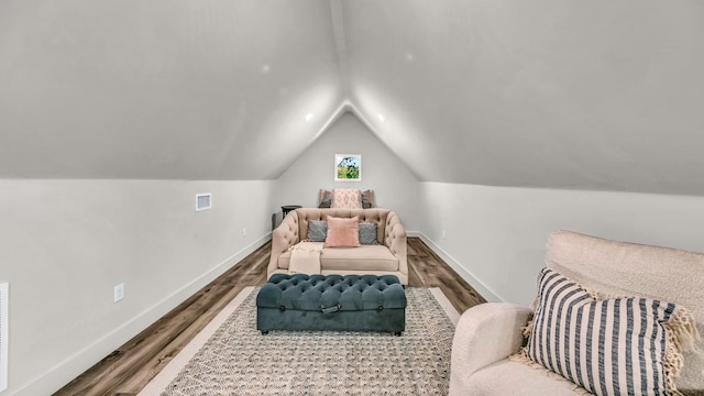 118 E Bay Dr, Bridgeport, TX 76426 - interior space with visible vents, wood finished floors, lofted ceiling, and baseboards