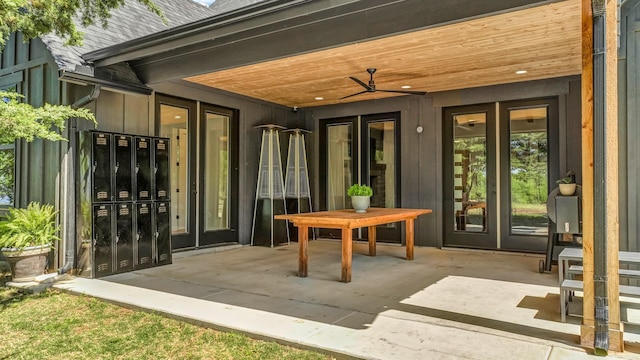 118 E Bay Dr, Bridgeport, TX 76426 - property entrance with a patio area, a shingled roof, ceiling fan, and french doors