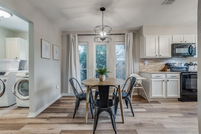 dining room featuring baseboards, separate washer and dryer, and light wood finished floors