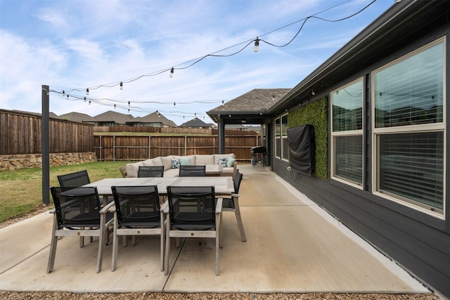 view of patio / terrace with a fenced backyard, outdoor dining area, outdoor lounge area, and grilling area