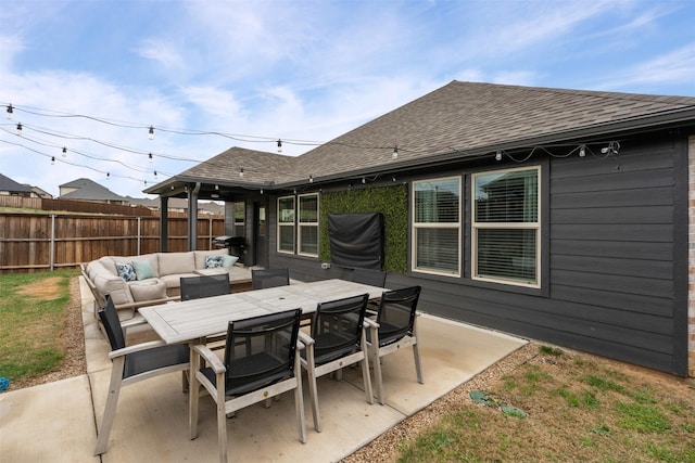 view of patio / terrace with outdoor lounge area, outdoor dining space, and fence