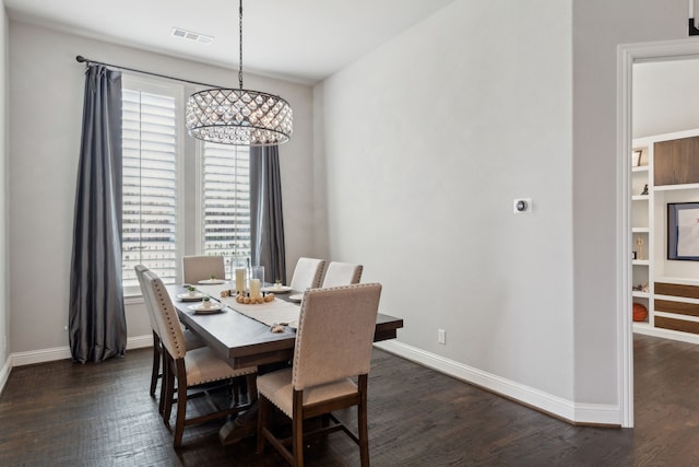 4600 Autumn Sage Dr, Prosper, TX 75078 - dining space featuring a chandelier, dark wood-style flooring, and baseboards